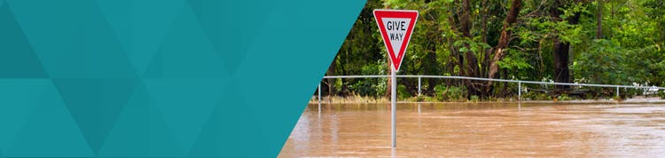 Give way sign in flood